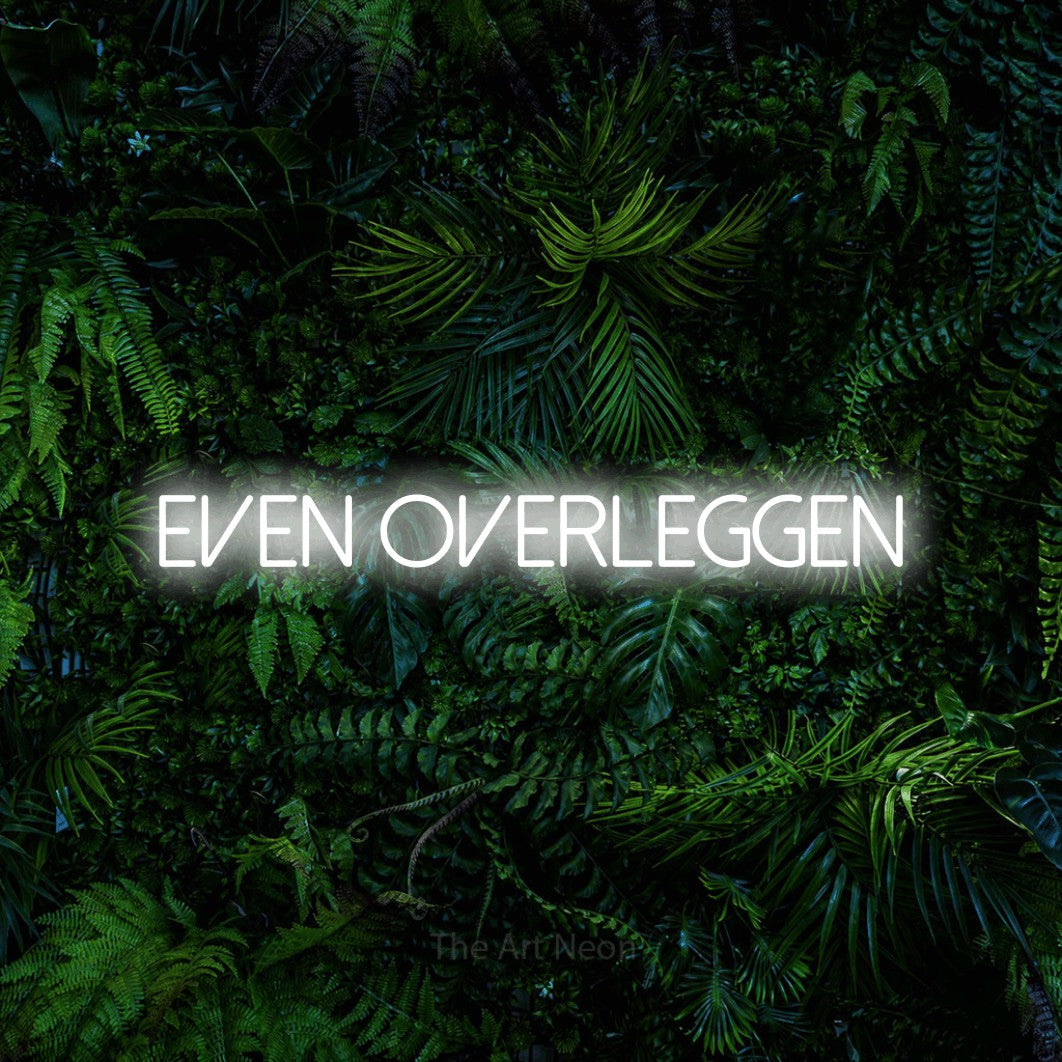 LED neon sign reading “even overleggen”, arranged in a single line.