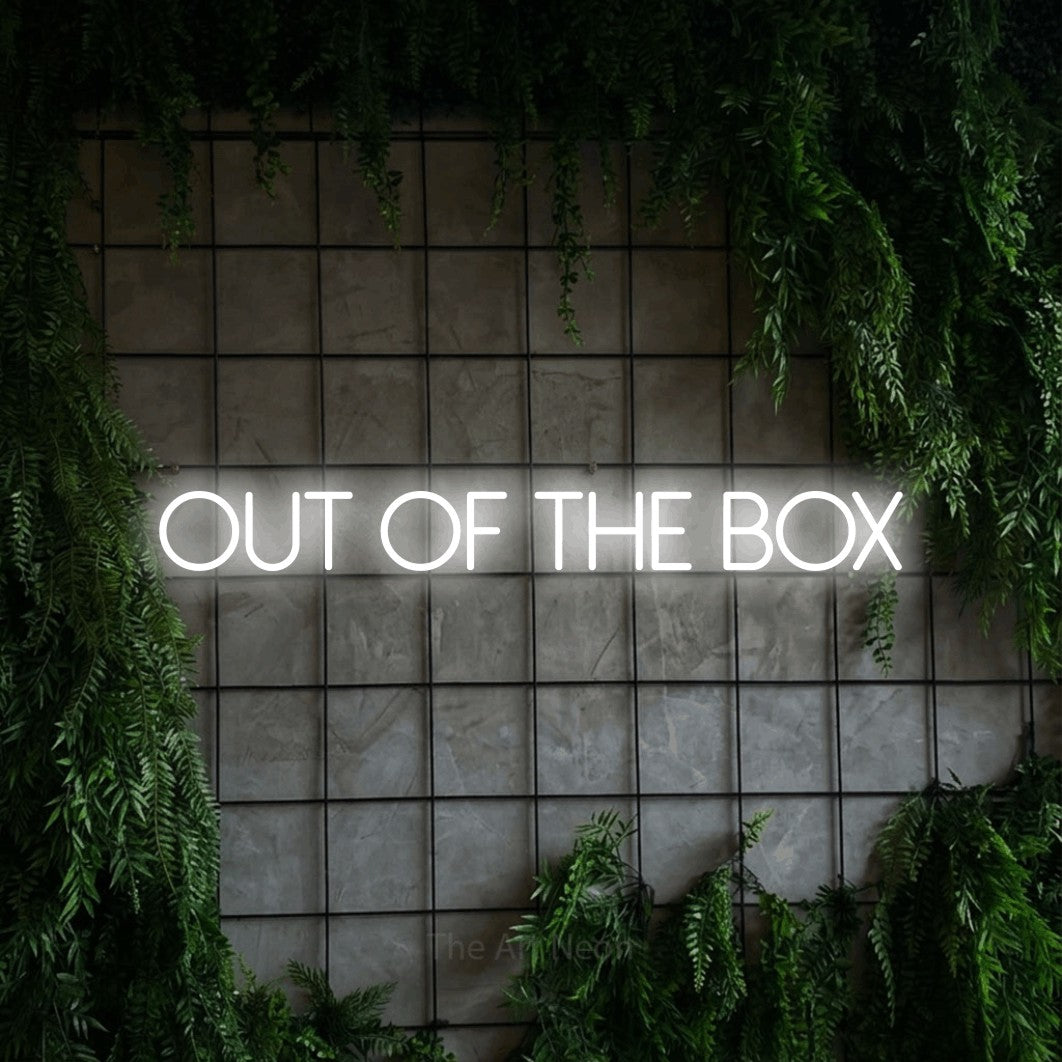 LED neon sign reading “Out Of The Box”, arranged in a single line.