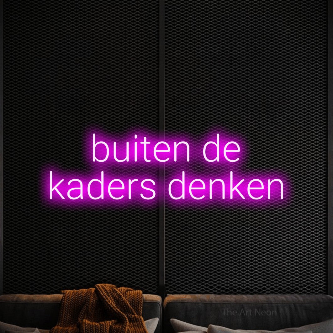 LED neon sign reading “buiten de kaders denken”, arranged in 2 lines.