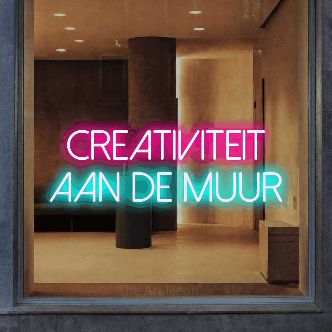 LED neon sign reading “Creativiteit aan de muur”, arranged in 2 lines.