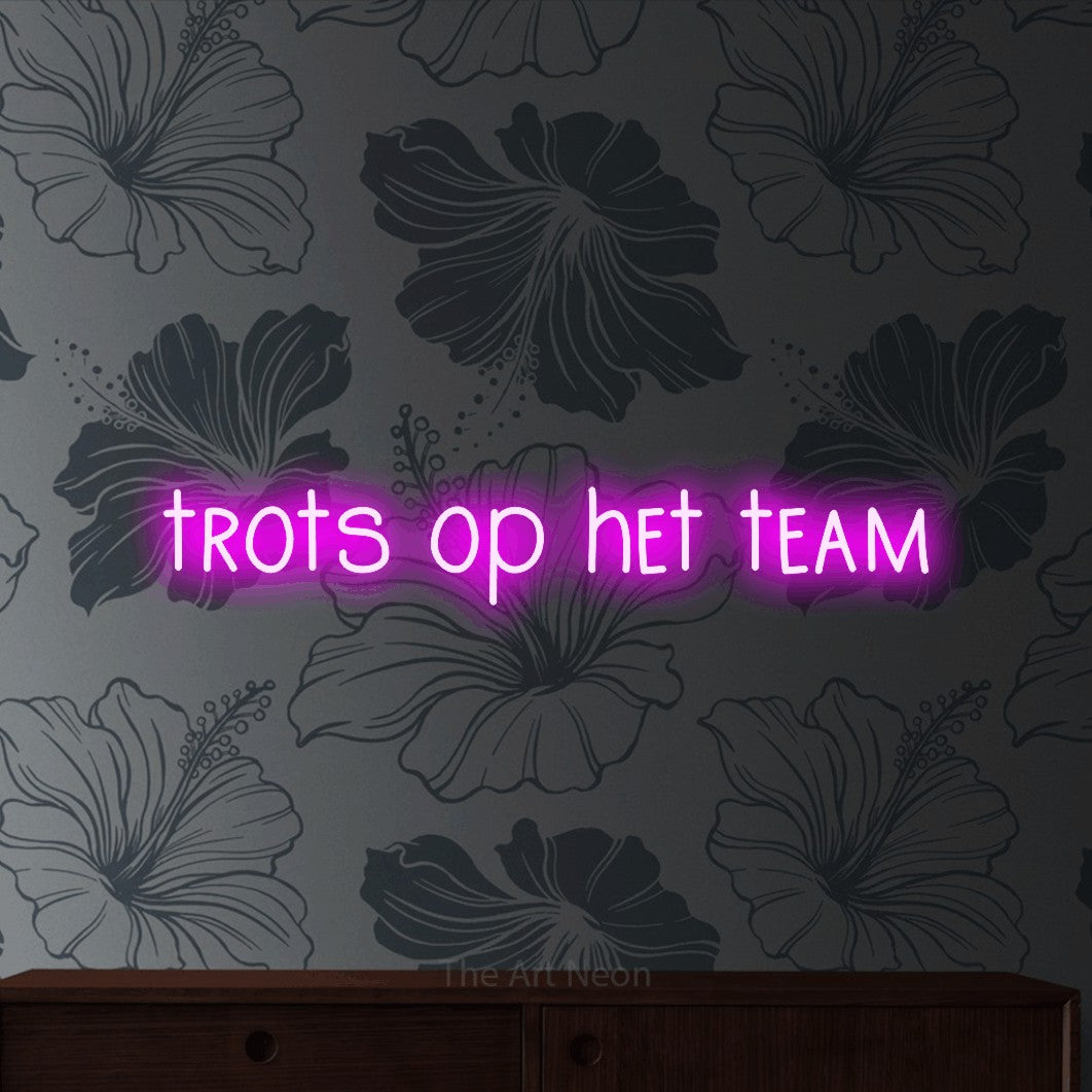 LED neon sign reading “trots op het team”, arranged in a single line.