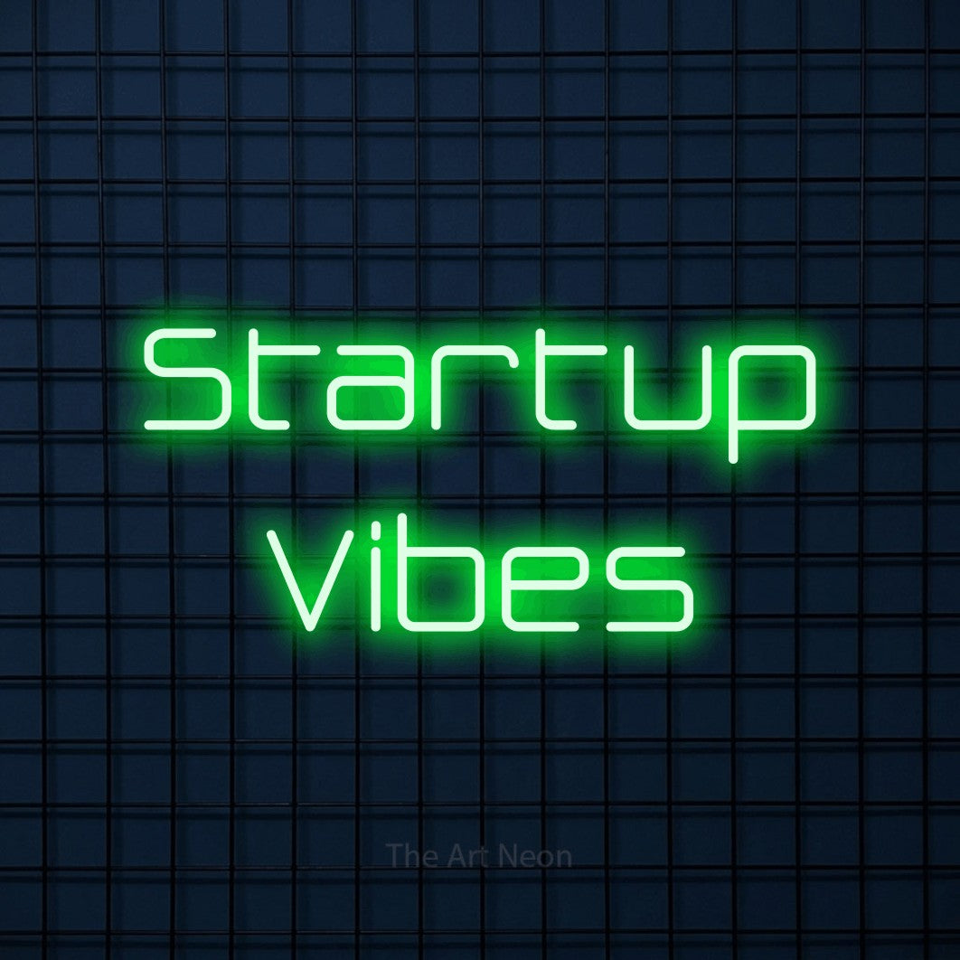 LED neon sign reading “Startup Vibes”, arranged in 2 lines.