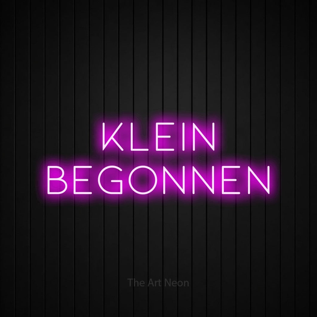 LED neon sign reading “Klein Begonnen”, arranged in 2 lines.