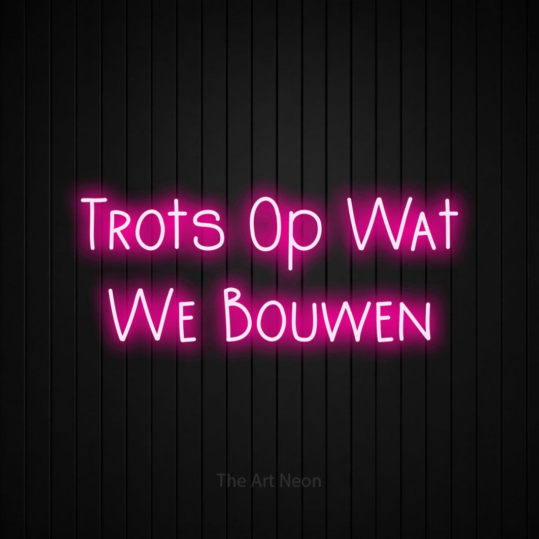 LED neon sign reading “Trots Op Wat We Bouwen”, arranged in 2 lines.