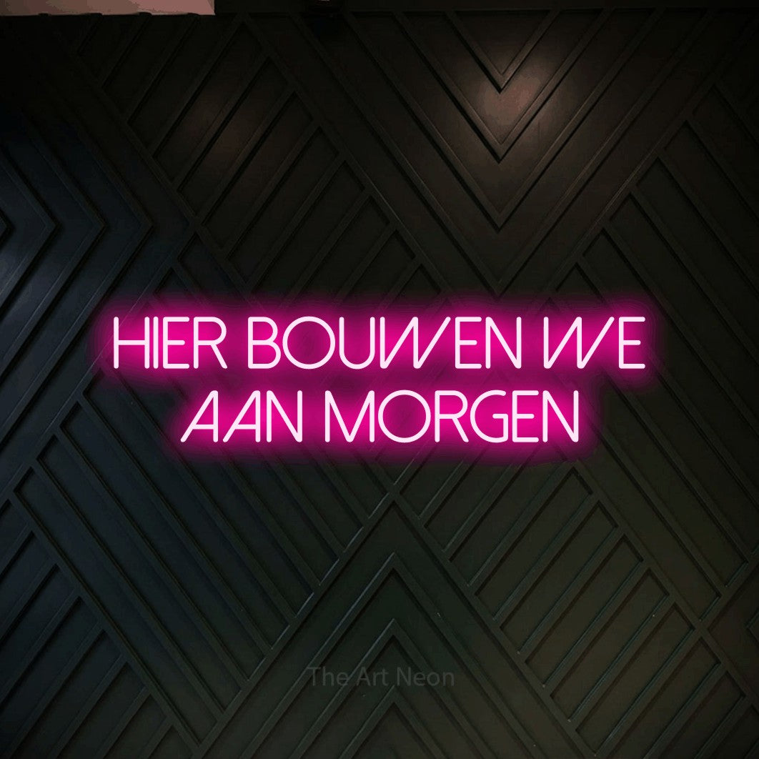 LED neon sign reading “hier bouwen we aan morgen”, arranged in 2 lines.