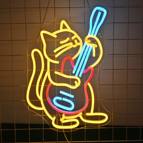 Op een LED-neonbord staat een cartoonkat afgebeeld die energiek een elektrische gitaar bespeelt.