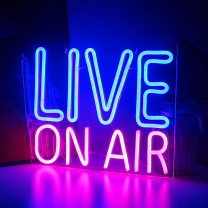 The image features a vibrant LED neon sign that reads "Live On Air" in bold, captivating letters.