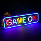 The image features a vibrant "Game On" LED neon sign, glowing with a bright, eye-catching hue.
