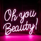 Op de afbeelding staat een levendig, handgemaakt LED-neonbord met de tekst 'Oh You Beauty'.