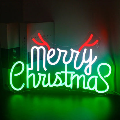 A bright, festive LED neon sign displaying the phrase "Merry Christmas" in a fun and inviting script.