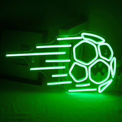 The image showcases a vibrant LED neon sign in the shape of a soccer ball.