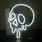 The image features a vibrant Halloween-themed LED neon sign.