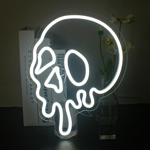 The image features a vibrant Halloween-themed LED neon sign.