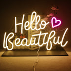 The image showcases a vibrant, handmade LED neon sign that reads "Hello Beautiful" in a playful, cursive font.