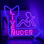 The image features a vibrant LED neon sign displaying the words "Live Nudes Girl" in playful cursive script.