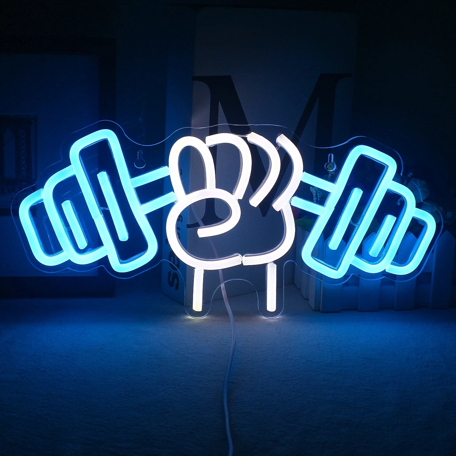 De afbeelding toont een levendig LED-neonbord in de vorm van een haltergewichthefmotief.