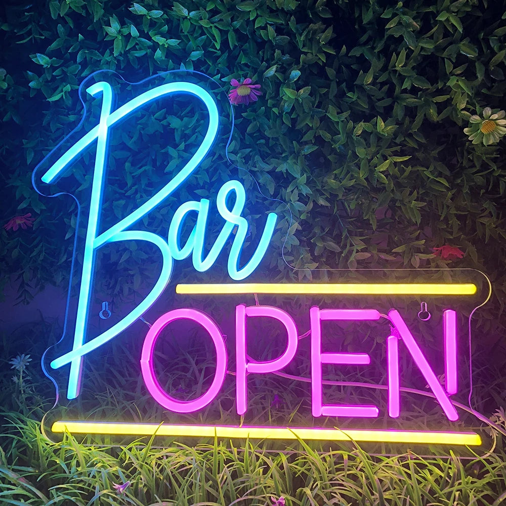 The image displays a vibrant LED neon sign that reads "Bar Open.