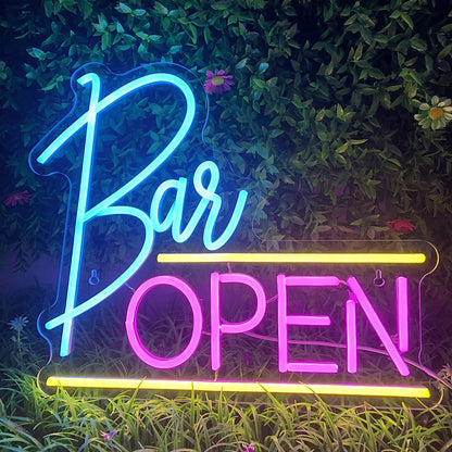 The image displays a vibrant LED neon sign that reads "Bar Open.