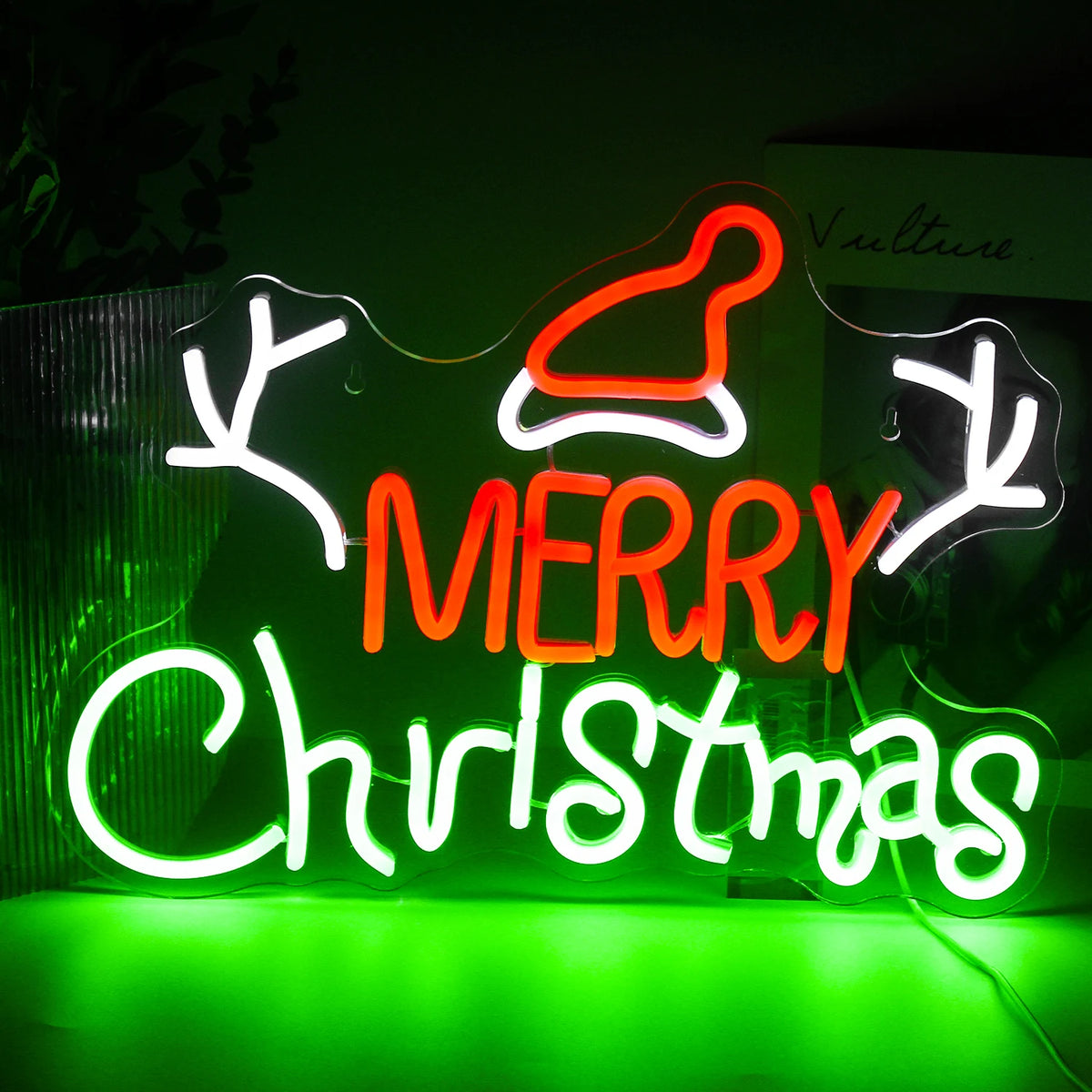 Een levendig LED-neonbord met het woord "Kerstmis" in stijlvolle, cursieve letters.