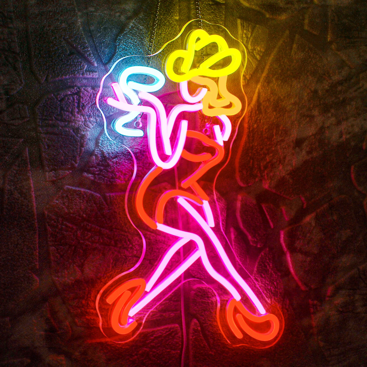 Een levendig LED-neonbord met het silhouet van een sensuele vrouw in een dynamische pose.