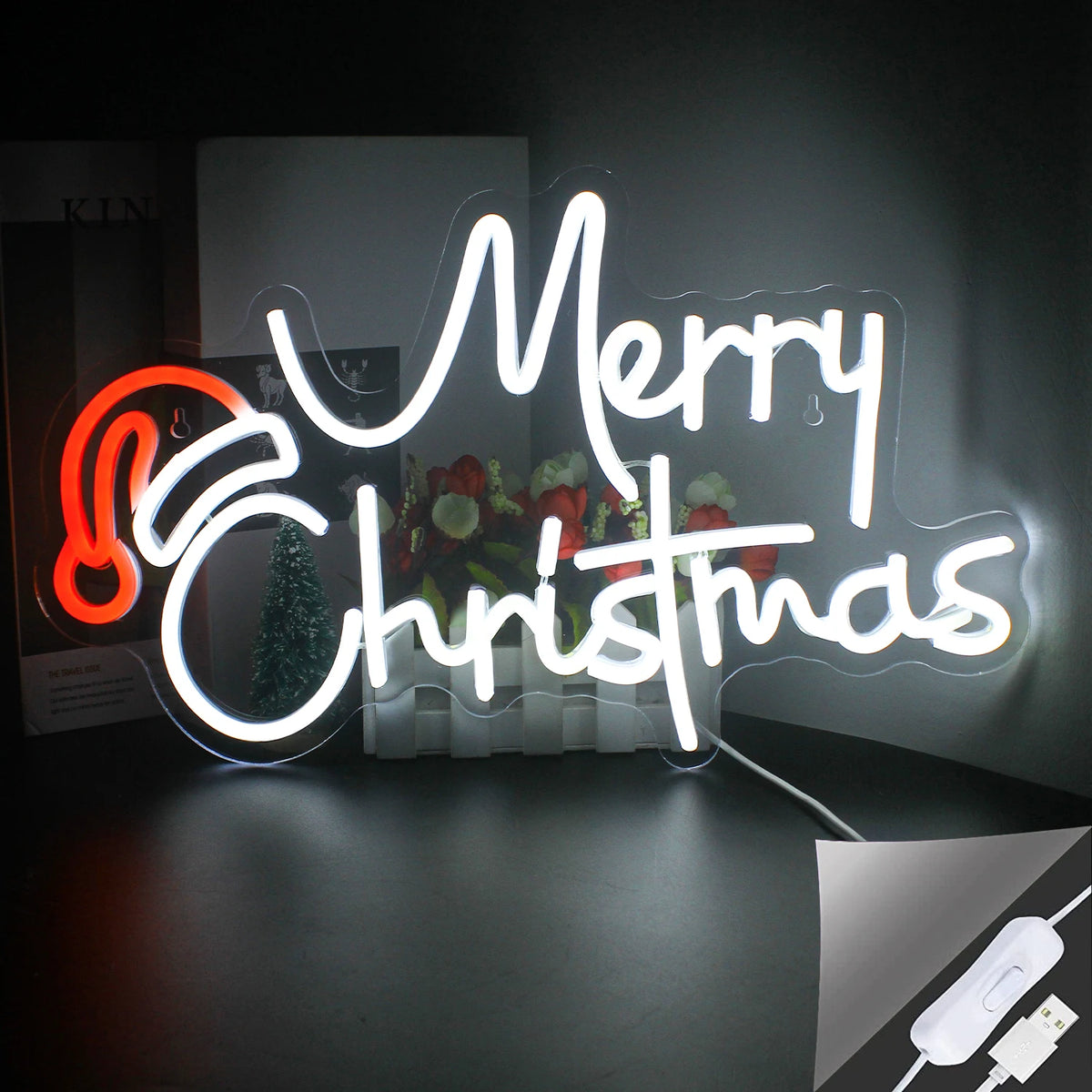 De afbeelding toont een levendig LED-neonbord in de vorm van een feestelijke kerstversiering.