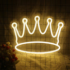 A vibrant LED neon sign shaped like a crown, featuring sleek, elegant lines and a luminous glow.