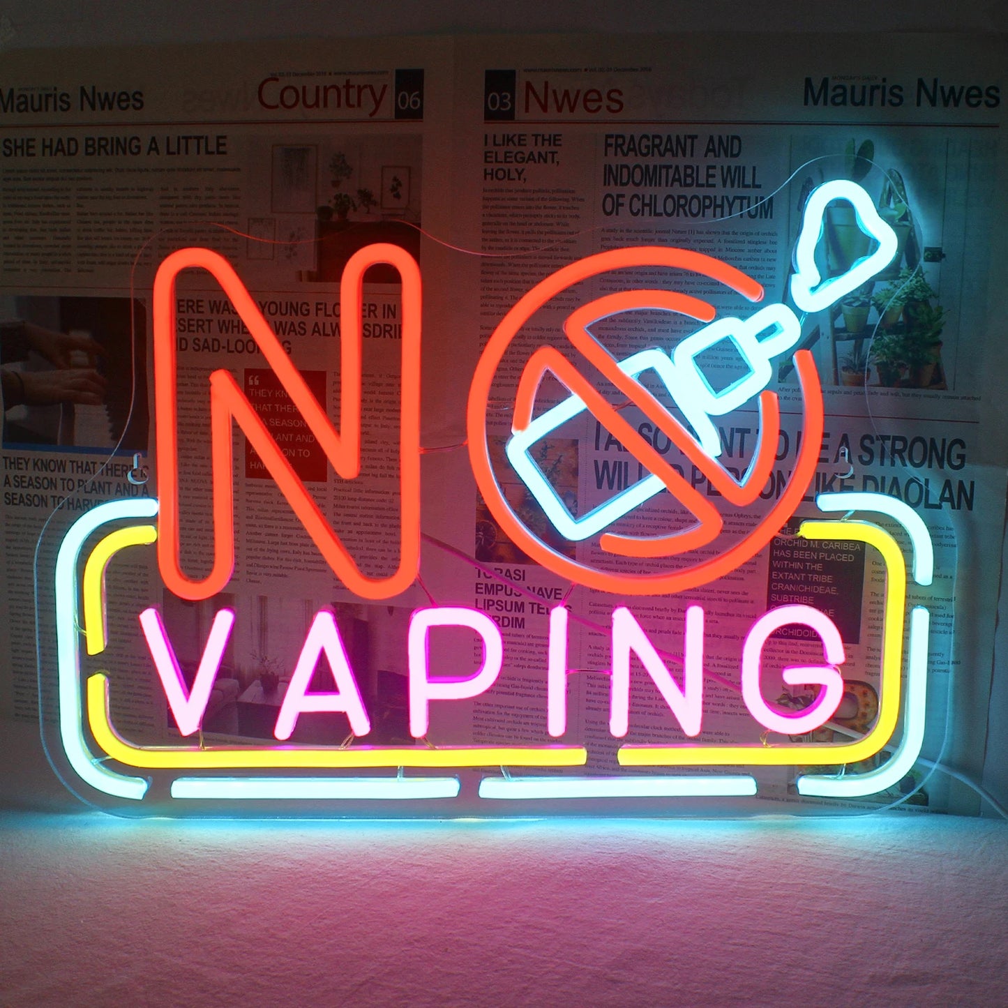 The image showcases a vibrant, handmade LED neon sign that reads "No Vaping.