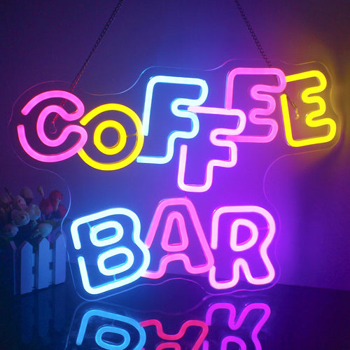 Een levendig LED-neonbord met de tekst "Coffee Bar" in een warme, gele tint.