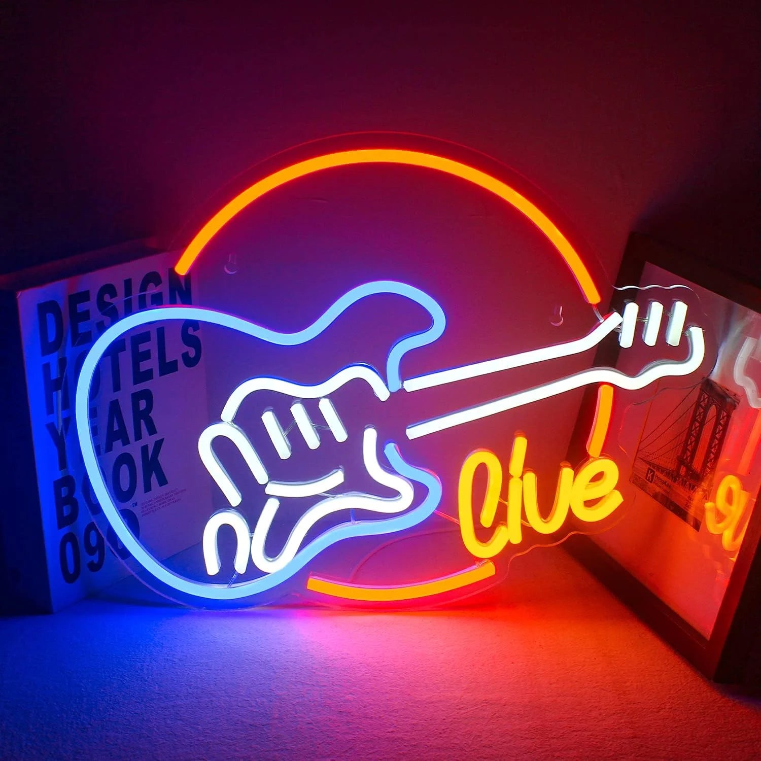 The image features a vibrant LED neon sign crafted in the shape of an electric guitar.