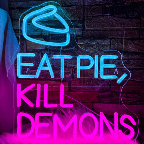 Op de afbeelding staat een handgemaakt LED-neonbord met de tekst "Eat Pie Kill Demons".