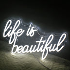 Een levendig, handgemaakt LED-neonbord met de tekst "Life is Beautiful" in een elegant, vloeiend lettertype.