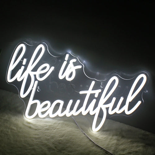Een levendig, handgemaakt LED-neonbord met de tekst "Life is Beautiful" in een elegant, vloeiend lettertype.
