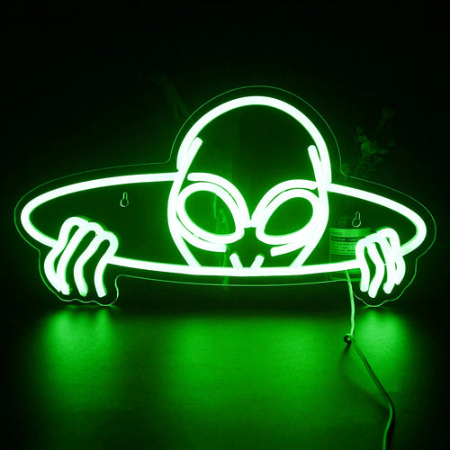Een levendig LED-neonbord in de vorm van een buitenaards hoofd, met grote, amandelvormige ogen.
