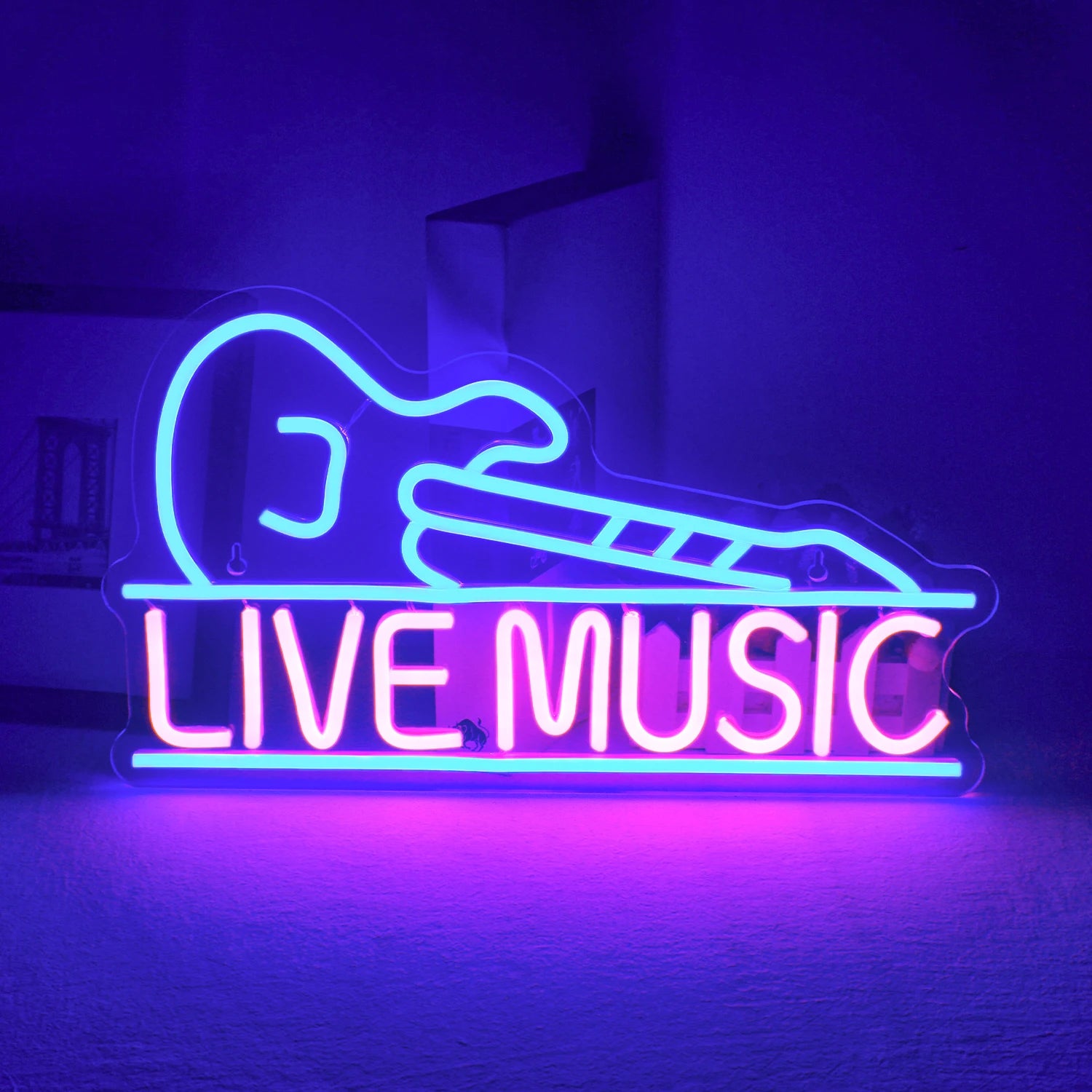 The image features a handmade LED neon sign shaped like an electric guitar, glowing vibrantly against a dark background.
