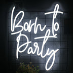 Op de afbeelding staat een levendig "Born to Party" LED-neonbord.