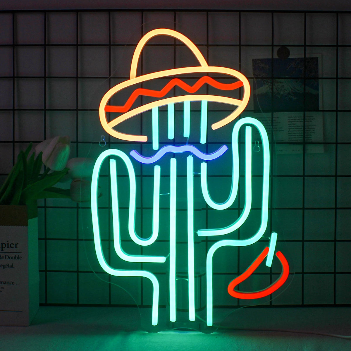 Een levendig LED-neonbord in de vorm van een cactus.
