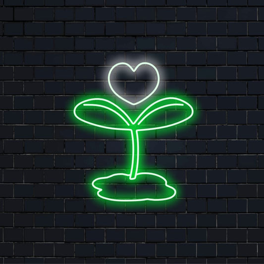"Sprout and Heart Neon Sign" combineert de frisheid van de natuur met oprechte warmte, waardoor er een stralende gloed ontstaat die zorgt voor een sfeer van groei en liefde in uw ruimte.