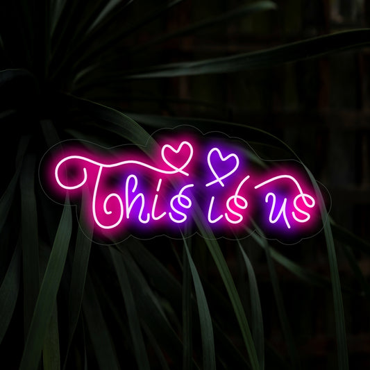 "This Is Us Neon Sign" embodies unity with its sentimental message, casting a warm glow that creates an atmosphere of connection and togetherness in your space.