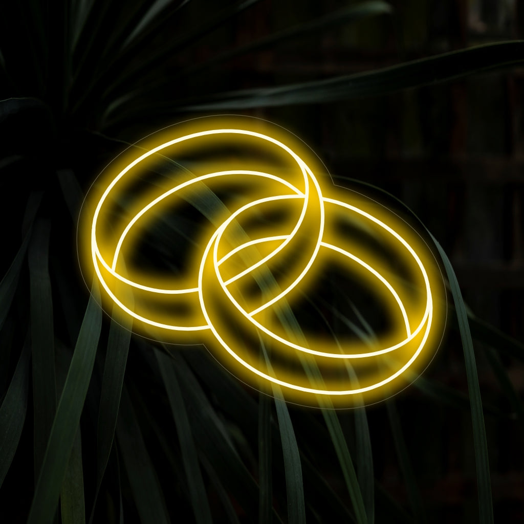 "Wedding Ring Neon Sign" voegt een vleugje romantiek toe met het elegante ontwerp en werpt een zachte en betoverende gloed die liefde en toewijding viert.