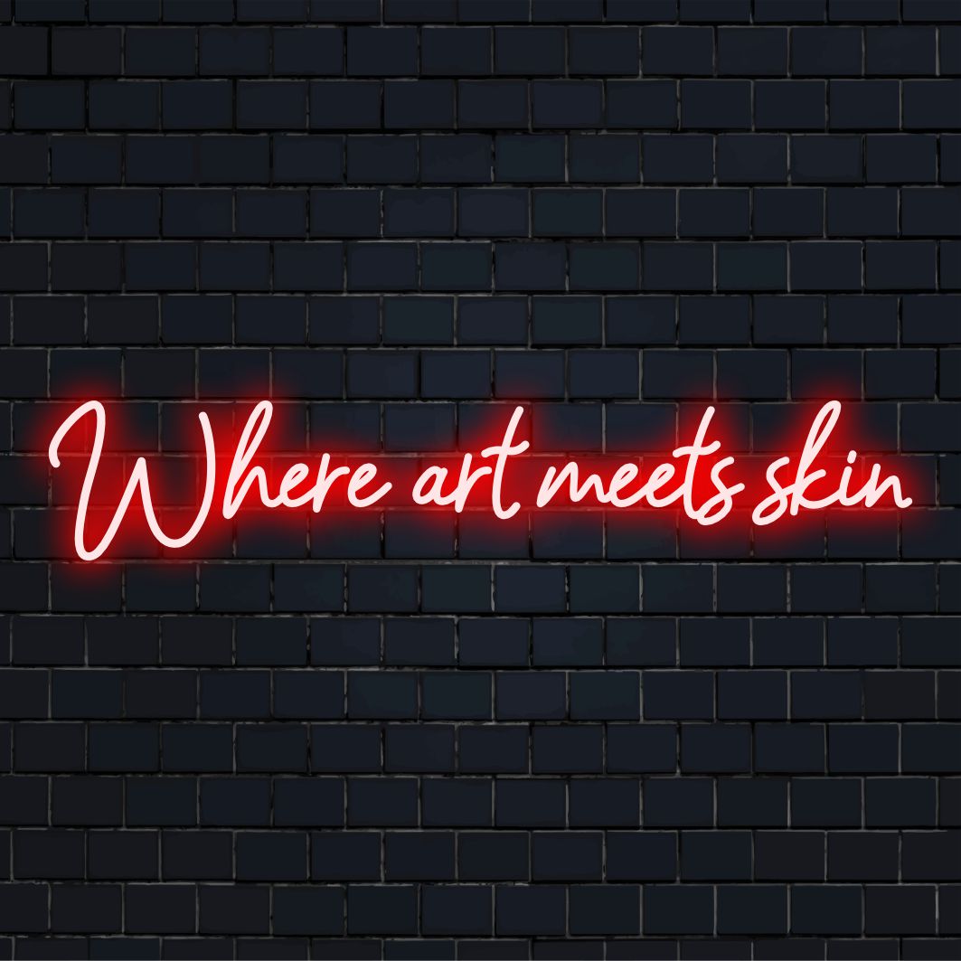 Levendig LED-neonbord met de tekst 'Where Art Meets Skin': een op maat gemaakt meesterwerk dat kunst combineert met lichtgevende decoraties.