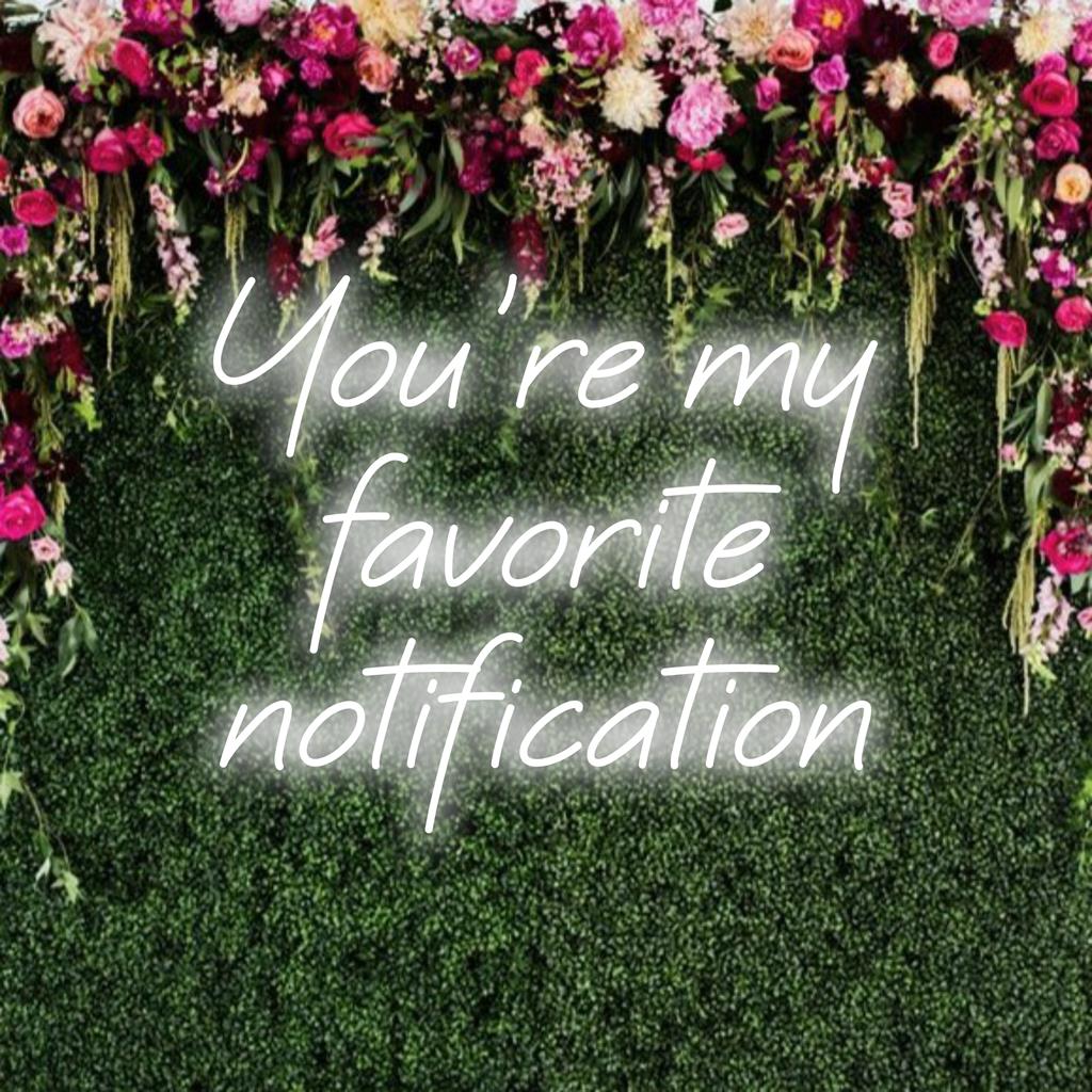 Bright custom LED neon sign displaying You're My Favorite Notification, perfect for adding a playful touch to any space.