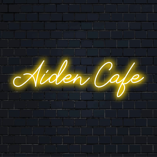 Aiden Cafe Custom Name Neon Sign, glowing lettering on dark brick wall