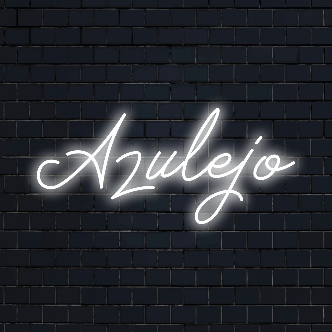 Azulejo Neon Sign, bright neon lettering on dark brick wall