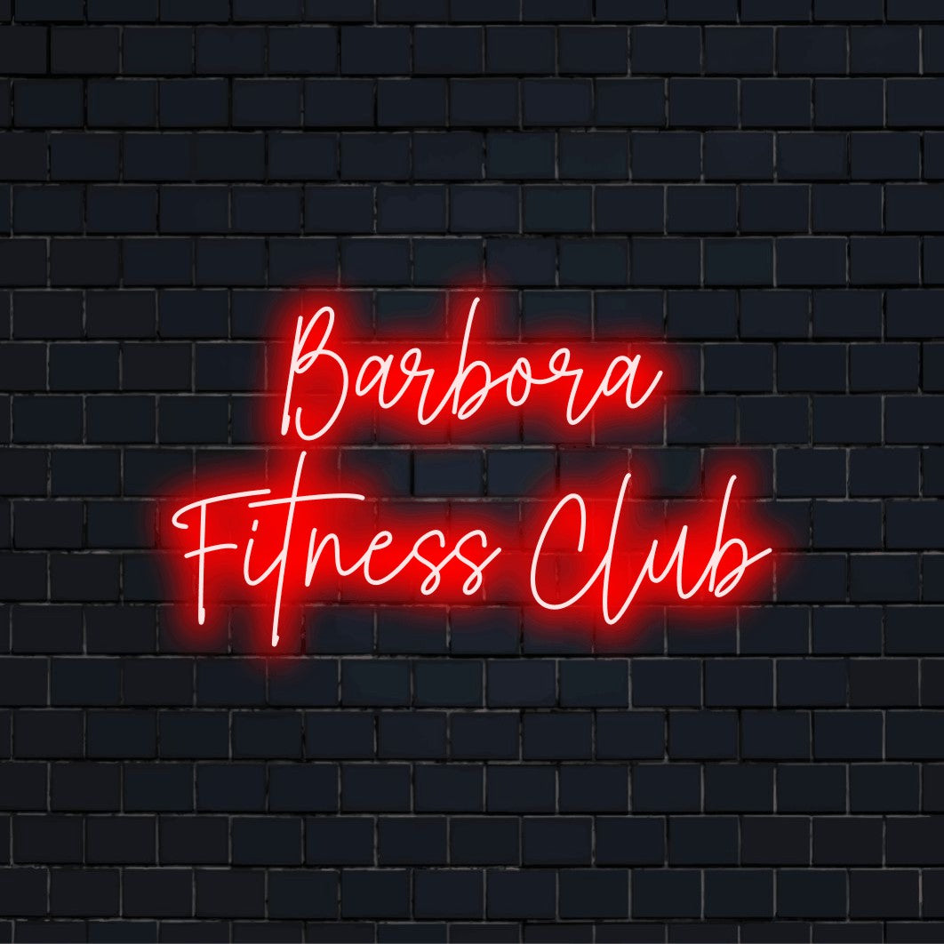 Barbora Fitness Club Personalized Neon Light with glowing lettering against brick backdrop