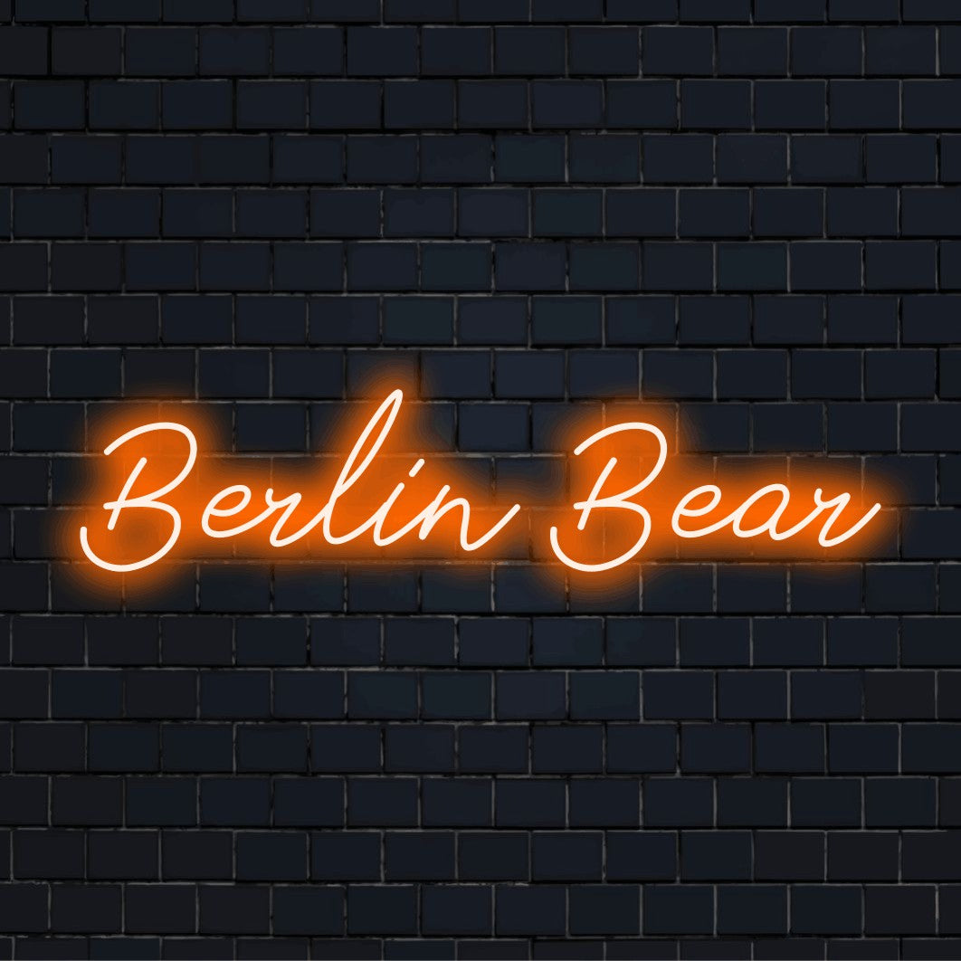 Berlin Bear LED Neon Sign, glowing neon text against black brick wall