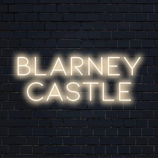 Blarney Castle Neon Light with bright neon glow on dark brick background