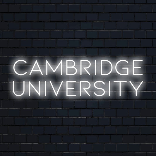 Cambridge University Neon Sign, glowing lettering on black brick background