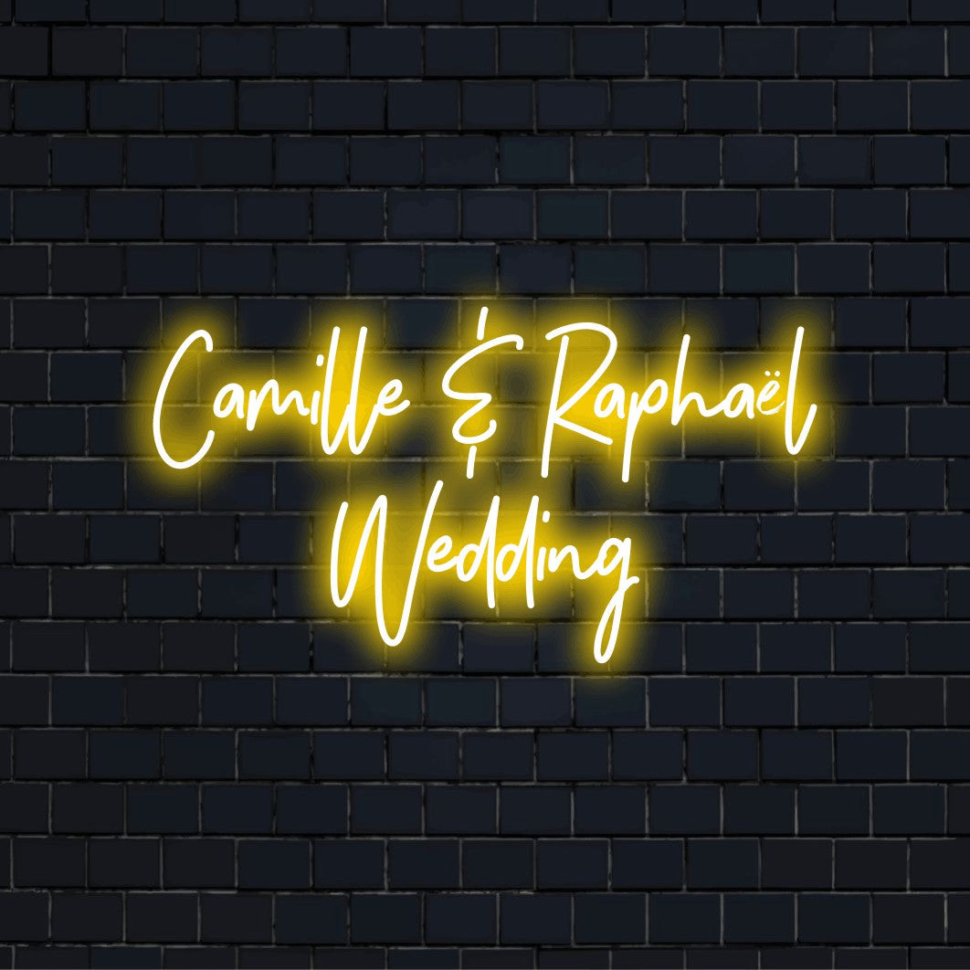 Camille _ Raphael Wedding Personalized Neon Light with glowing lettering against black brick wall
