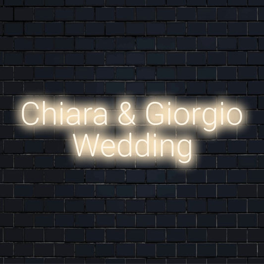 Chiara _ Giorgio Wedding Custom Name Neon Sign, glowing wall decor against brick backdrop