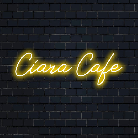 Ciara Cafe Personalized LED Neon Sign, bright LED glow on black brick background